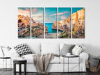 Sun-kissed seaside painting showcasing warm stone facades and turquoise waves, transformed into an immersive wall art piece and premium canvas print artwork.