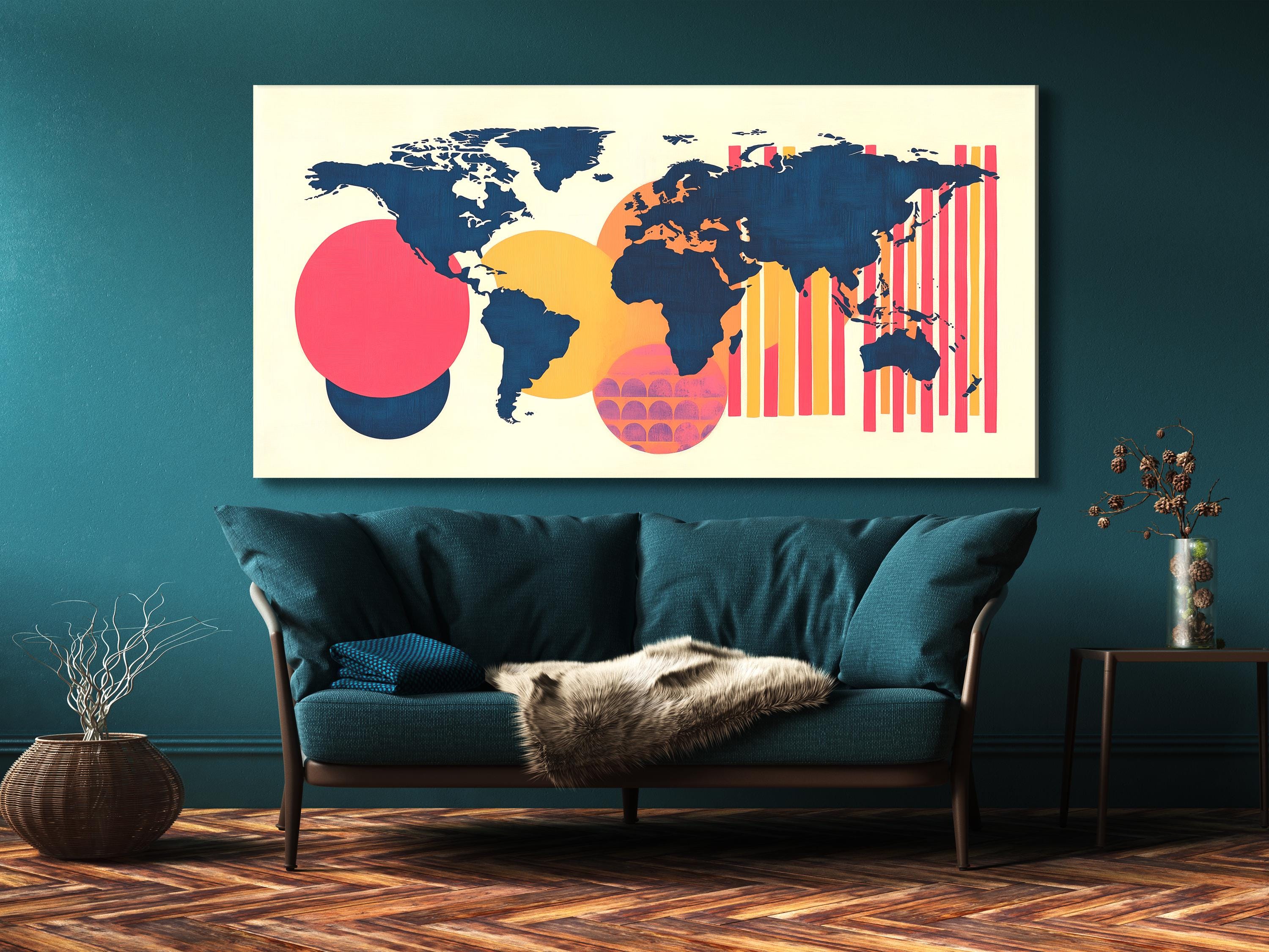 Abstract global map canvas in navy, coral and marigold over a cream ground, staged in a teal living room