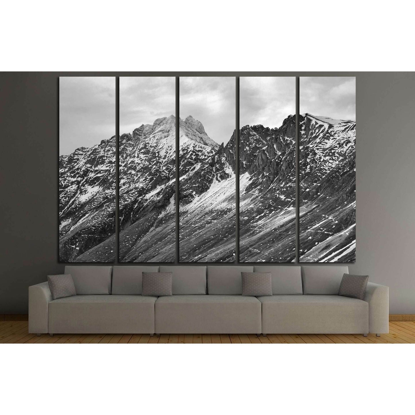 Black and White Rugged Mountains Wall Art for Modern InteriorsThis canvas print presents a striking black and white image of rugged mountain peaks, their sharp contrasts and textures highlighted to create a sense of depth and grandeur. It's a timeless pie