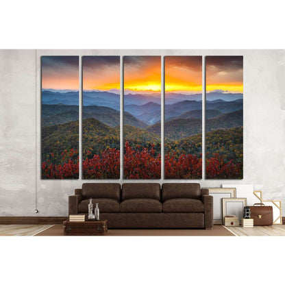 Autumn Sunset Over Mountains Canvas Print for Warm Home DecorThis canvas print portrays a vibrant autumnal sunset over a mountain range, with the warm colors of the foliage providing a stark contrast against the cool blues of the distant peaks, creating a