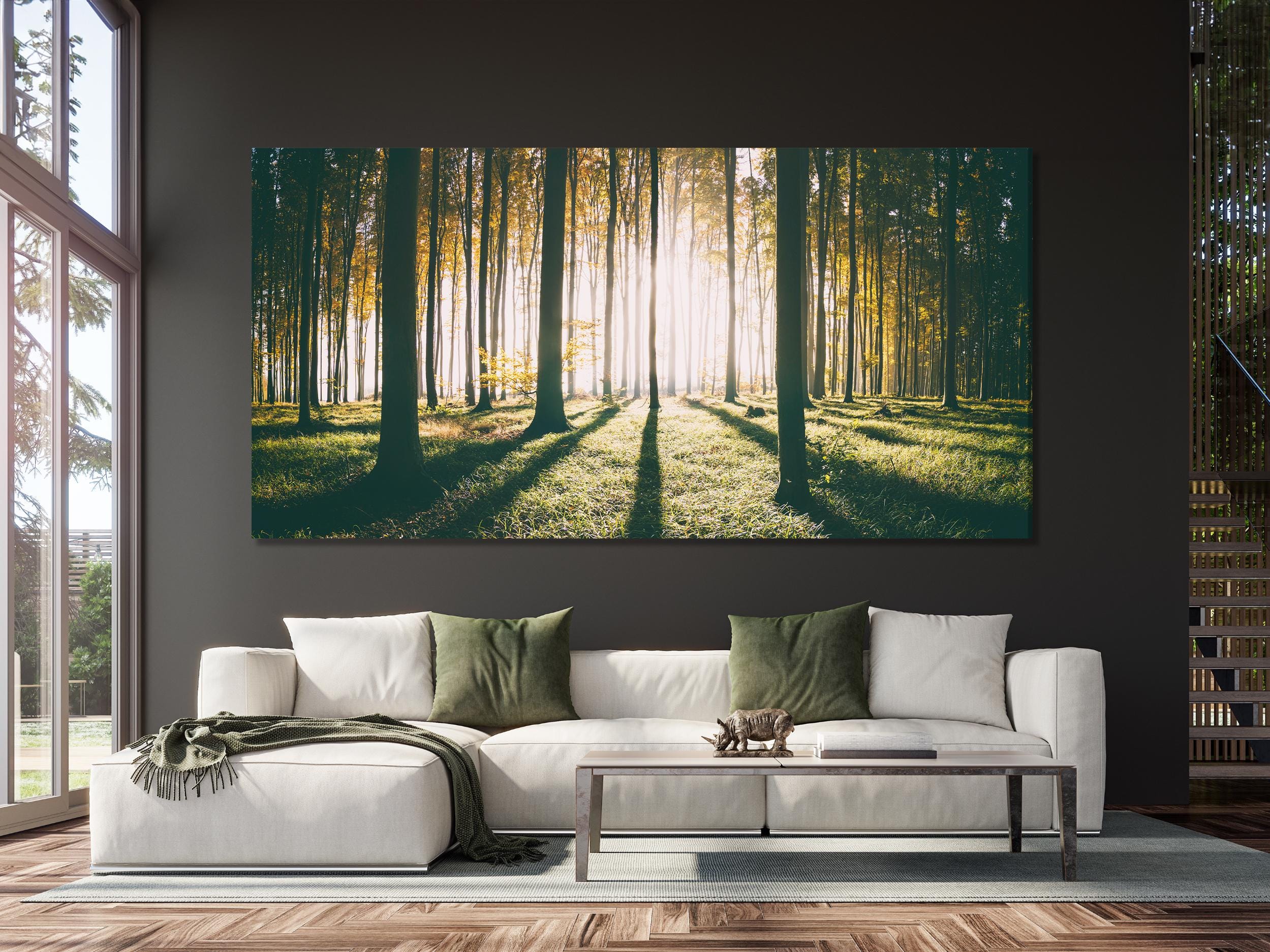 Enchanting forest canvas print highlighting soft sunlight filtering through towering trunks, creating a tranquil painting that complements modern or rustic artwork themes.