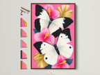 Butterfly Canvas Artwork with a Brown Frame. This pink hibiscus wall art features white butterflies. A tropical flower artwork perfect for adding a girly modern touch to your home decor. See all frame options available.