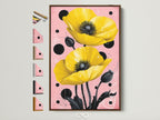 Brown frame showcasing a yellow poppy canvas print. Floral wall art adds a botanical touch to bedroom wall decor. The pink and black accents create a modern aesthetic. Explore frame options to enhance your artwork.