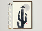 Cactus Birds Canvas Print in a brown frame. Desert silhouette artwork adds southwestern decor to your study room. This nature canvas print features minimalist monochrome art. A zen wall art piece with desert birds.