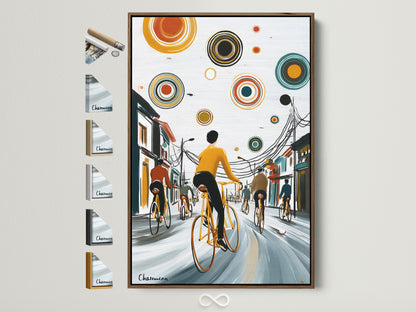 City Cyclists artwork in a brown frame is displayed. The artwork shows cyclists on a city street. Colorful circles float above them. Frame options are visible on the side. Perfect urban landscape wall art.