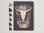 Artwork featuring a bovine skull with floral elements. It is encased in a brown frame. This piece is part of a collection with various frame options. Perfect art to add a touch of rustic charm. Consider the different frame styles available.