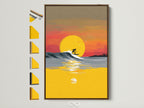 Elevate your space with coastal charm. This Surfing Canvas Print features a stunning sunset wave. The artwork is framed in a warm brown tone. Discover frame options for a personalized touch. Perfect for adding summer vibes to any room in your home or office.