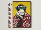 Pop Art Primate canvas wall art in a brown frame. The artwork features a monkey wearing glasses and a patterned red jacket. Frame options are displayed on the side. This contemporary animal artwork adds a playful touch to any space. Perfect for office wall art or funky home decor.  A colorful and quirky addition to any art collection.