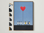 A contemporary artwork featuring a red heart balloon above a line of medical personnel. The artwork is framed in a brown frame. See all the frame options available. This medical team artwork is perfect for adding a touch of hope to any healthcare setting. It is ideal for doctor's offices and hospitals.