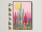 Explore framed Southwestern cactus artwork. The art features pink and teal botanical prints. A brown frame surrounds the art. See all frame options available for this desert wall art. Perfect for modern minimalist or boho aesthetics.