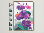 Floral Canvas Print with a Brown Frame. This vibrant botanical wall art features purple flower artwork. Perfect modern home art for living rooms bedrooms or offices. See all our frame options displayed.