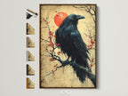 Raven Canvas Print with a Brown Frame. The frame options are displayed on the side. This Japanese art wall decor features a bird on a cherry blossom branch. Perfect gothic print for office art.