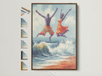Joyful seascape wall art in a brown frame. The artwork depicts a man and women jumping over a wave on the beach. View all frame options to customize your wall art. Perfect coastal artwork for your vacation home decor