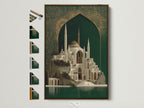 A framed Islamic Architecture Canvas Artwork with a brown frame is displayed. The artwork showcases a beautiful mosque with emerald green and gold accents. Frame options are visible. Perfect for adding cultural elegance to any room. Find the ideal frame to complement your islamic art print and home decor.