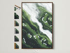 Green abstract art in a brown frame is displayed with frame options. Marble fluid canvas wall art brings a modern touch. The emerald and white swirl artwork is perfect for office wall decor. Contemporary art elevates minimalist styles. It's ideal for homeowners and interior designers.