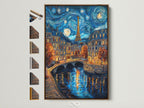 Artwork with a Brown frame shows frame options available. The art piece is hanging on a white wall. The framed art is a night scene with the Eiffel Tower in Paris. The artwork is reflecting on the water.