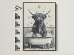 A Highland Cow in Tub artwork is displayed in a brown frame. The artwork features a black and white Scottish cow enjoying a bubble bath. Frame options are visible on the side. This farmhouse bathroom art adds humor and character to your space.
