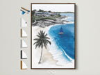 Coastal beach canvas artwork in a brown frame. This tropical ocean artwork captures a serene beach house scene. The blue ocean artwork features a sailboat print. Frame options are displayed on the side. Perfect nautical wall art for summer decor.