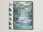 Waterfall canvas artwork with a brown frame is displayed. The artwork features a serene landscape with turquoise water. See the various frame styles available. Each frame choice enhances the nature wall art.