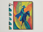 Equestrian Canvas Print with a brown frame. This horse rider wall art features tropical leaves. This colorful artwork is perfect for adding a modern touch. See all our frame options.
