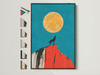 Wolf Moon artwork with a brown frame is displayed. Frame options are showcased on the side. It is a southwestern desert wall art piece. Teal and orange colors create a serene atmosphere. Perfect for adding a touch of wildlife to your bedroom wall decor.