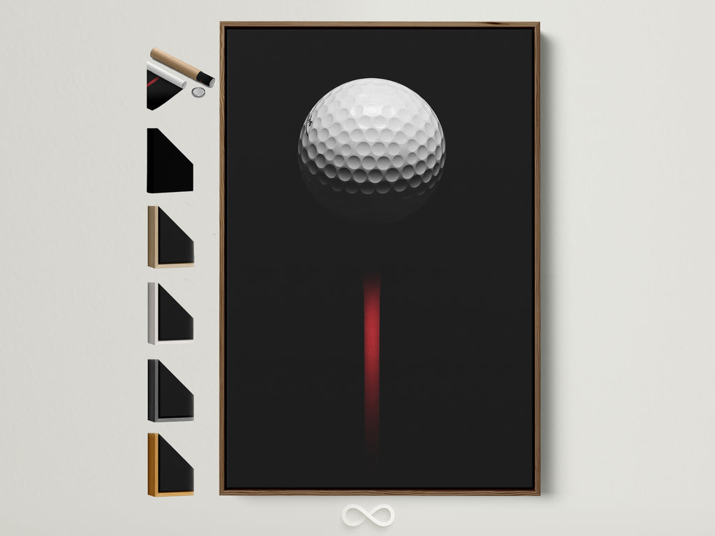 Golf ball canvas artwork in a brown frame. This modern sports wall art features a minimalist black and red golf decor. Perfect for a man cave or office. See frame options on the side.