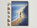 Ocean Reflection artwork with a brown frame is displayed. This coastal wall art features blue and gold abstract elements. See all frame options to customize your beach canvas print. Perfect for adding a touch of seaside artwork to your bedroom decor.