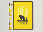 Bear Canoe artwork framed in a brown frame. The print is yellow and features a bear and man in a canoe. Explore frame options to match your cabin decor. Find the perfect frame for your forest adventure artwork.