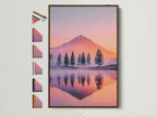 Mountain Lake canvas artwork with a brown frame. See all frame options available. The artwork features a serene sunset landscape. Pastel colors create a calming nature photography piece. It is ideal for adding modern decor to any bedroom.