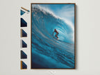 A surfer rides a large wave in a fine art print. The artwork is framed in a brown frame. All frame options are displayed on the side. Enhance your home with stunning framed art.