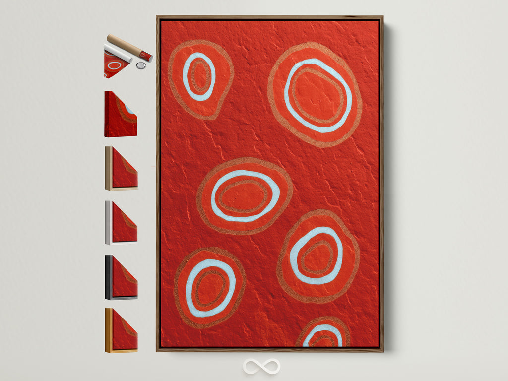 A vibrant abstract red canvas print is displayed in a brown frame. Explore frame options for this modern geometric wall art. The bold circle artwork adds a touch of contemporary style to any dining room decor. Discover the perfect frame to complement your space. All frame options are conveniently showcased.