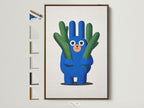 A cute cactus artwork print is displayed in a brown frame. The frame options are showcased on the side. This whimsical plant canvas is great for a kids room. It adds a touch of blue green nursery wall art.