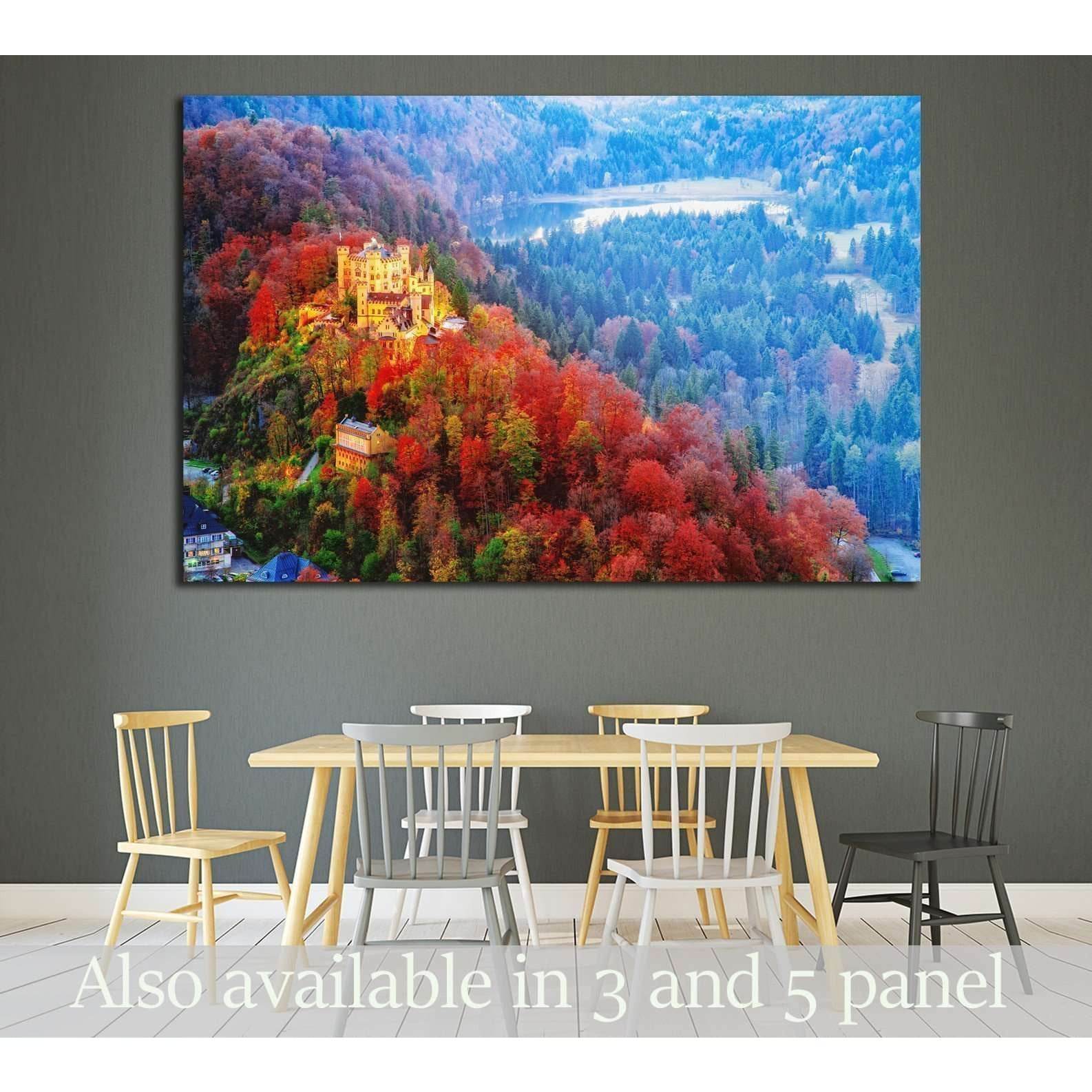 Hohenschwangau castle, Germany, Bavaria region №1811 Ready to Hang Canvas PrintThis canvas print showcases a vibrant autumnal landscape with a majestic castle nestled among richly hued trees. The warm reds and oranges of the foliage create a striking cont