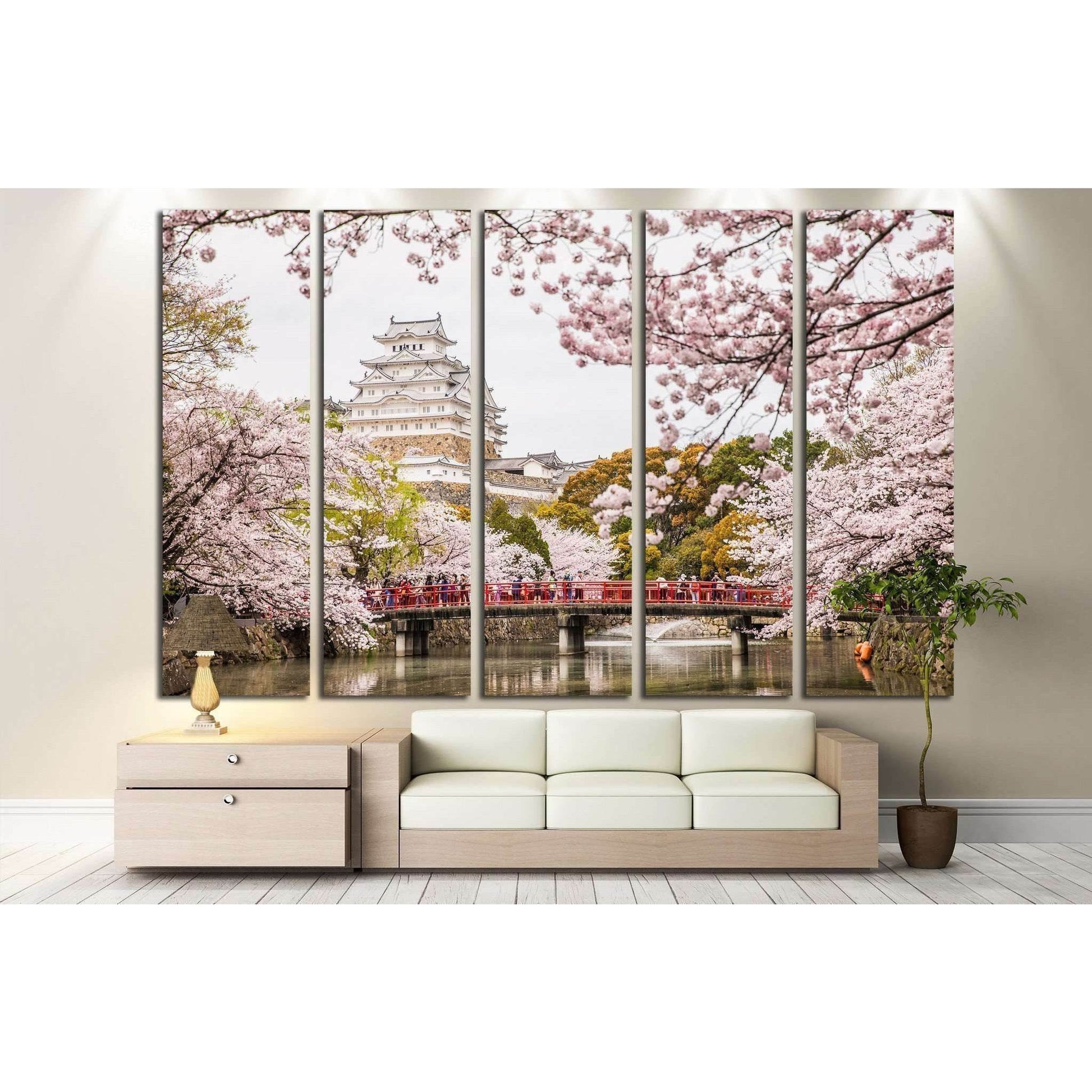 Himeji Castle and Cherry Blossoms Canvas Print for Cultural DecorThis canvas print beautifully captures Himeji Castle, one of Japan's most renowned castles, framed by the delicate pink blossoms of sakura trees. The vibrant scene is enriched by the presenc