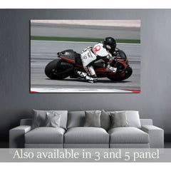 MotoGP rider Loris Capirossi of the Pramac Racing Team №2473 Ready to Hang Canvas PrintCanvas art arrives ready to hang, with hanging accessories included and no additional framing required. Every canvas print is hand-crafted, made on-demand at our worksh