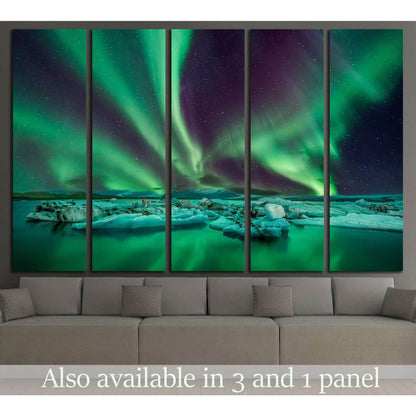 Northern Lights Over Icy Landscape Canvas Print for Modern Home DecorThis canvas print showcases the magnificent Northern Lights, or Aurora Borealis, with their ethereal green hues dancing over a serene icy landscape. It's a piece that would bring a sense