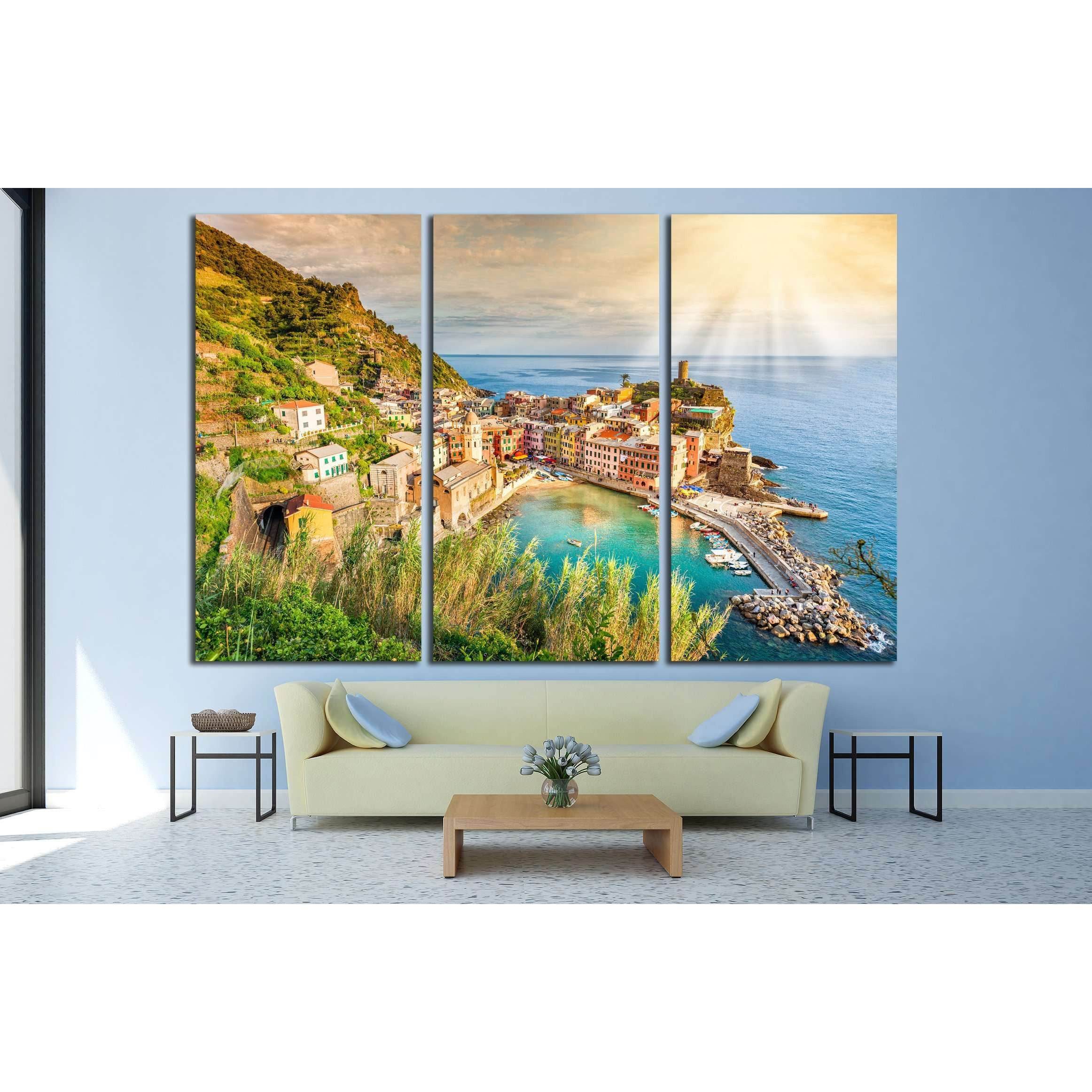 Vernazza Cinque Terre Canvas Print - Italian Seaside Village Wall ArtThis canvas print beautifully captures Vernazza, one of the five centuries-old villages of Cinque Terre, Italy, characterized by its colorful houses and the quaint harbor set against the