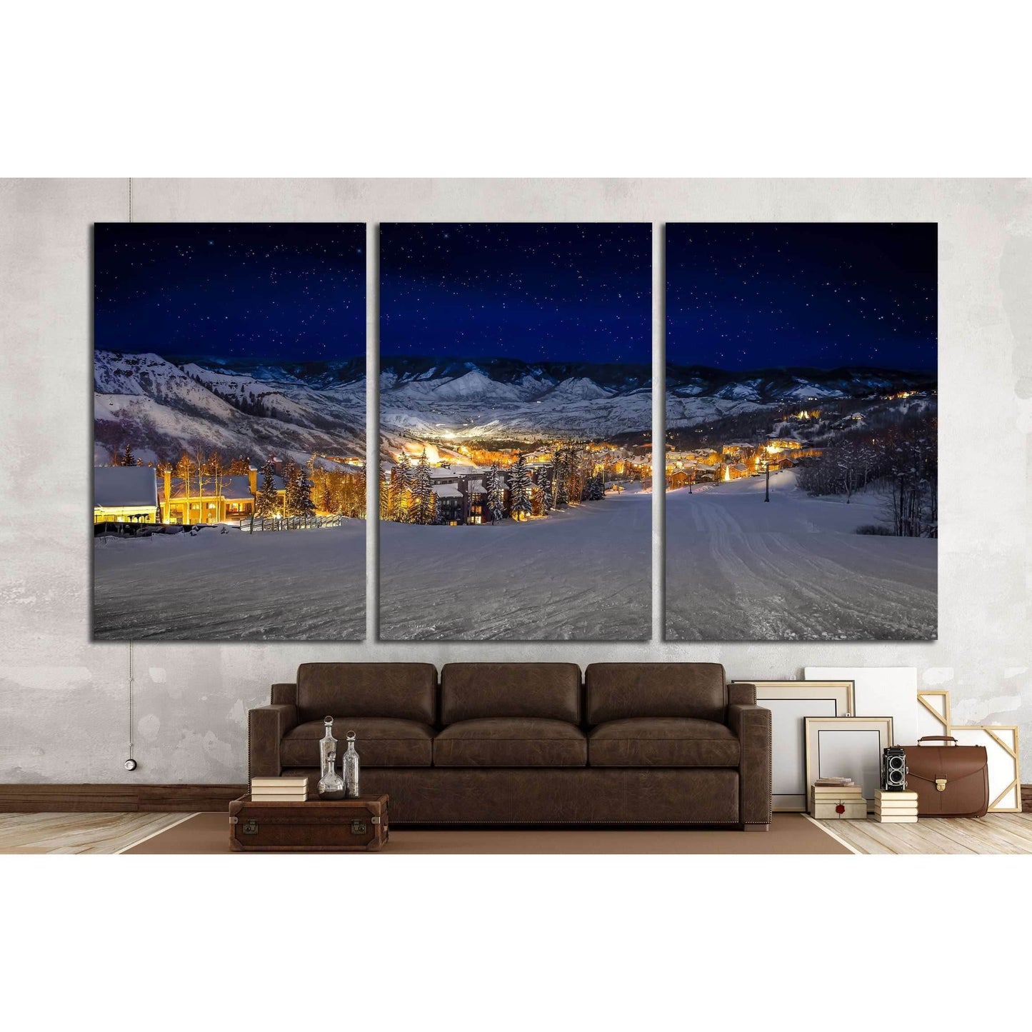 Starlit Ski Village Canvas Print for Cozy Winter DecorThis canvas print features a night-time view of a snow-covered ski village, with glowing lights that offer a warm contrast to the cool blue hues of the evening. The clear starry sky adds a touch of mag