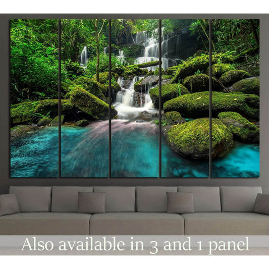 Thailand Forest Waterfall Canvas Art for Nature-Inspired SpacesThis canvas print showcases a verdant waterfall oasis, where the water flows over moss-covered rocks in a tranquil forest. The lush greenery and serene water create a refreshing and rejuvenati