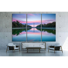 Washington Monument and Lincoln Memorial at Sunset Inspirational Office ArtThis canvas print captures a serene sunrise or sunset over the Reflecting Pool with a view towards the Washington Monument in Washington, D.C. The tranquil waters mirror the vibran
